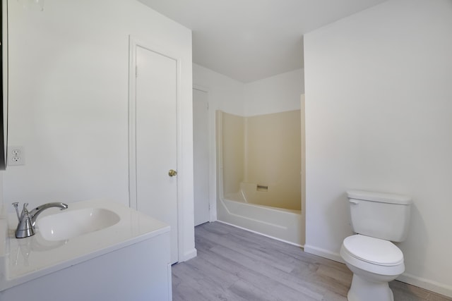 3119 Essex Rd, Coolbaugh Township, PA 18466 - bathroom featuring wood finished floors, vanity, and bathtub / shower combination