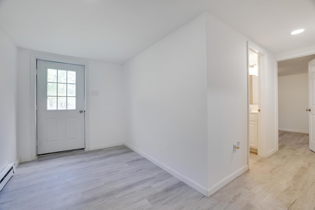 3119 Essex Rd, Coolbaugh Township, PA 18466 - entryway with baseboard heating, light wood-type flooring, and recessed lighting