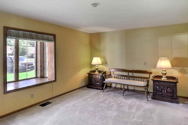 bedroom featuring carpet flooring and baseboards