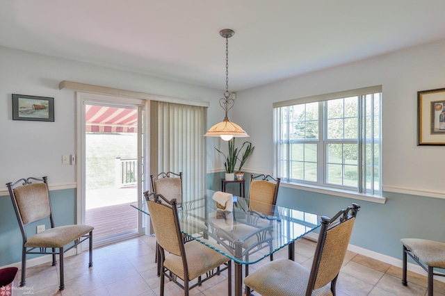 dining room with light tile patterned flooring