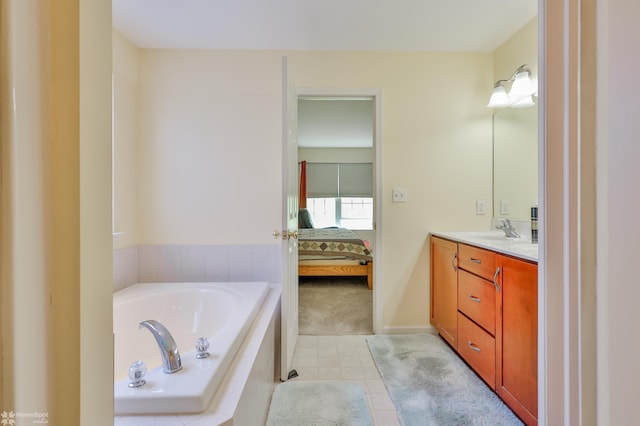 ensuite bathroom with a garden tub and vanity