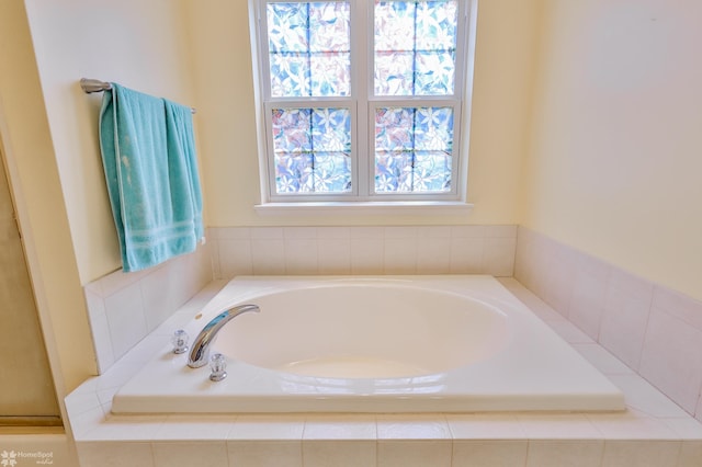full bathroom featuring a garden tub