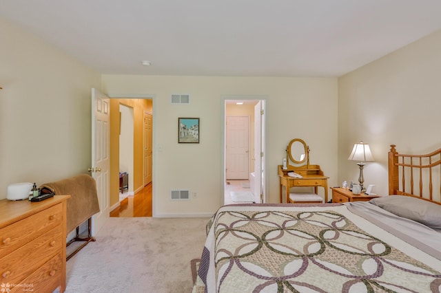 carpeted bedroom with baseboards