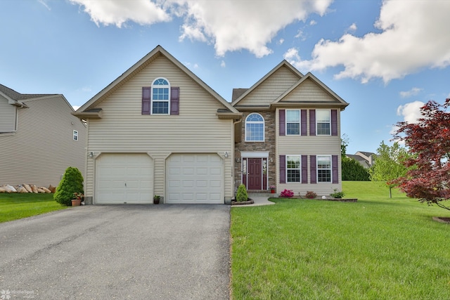 view of front facade featuring driveway, an attached garage, stone siding, and a front yard