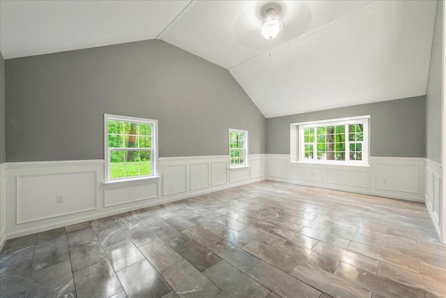 1572 Gardner Rd, Stroudsburg, PA 18360 - additional living space with vaulted ceiling, a wainscoted wall, and a decorative wall