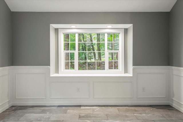 1572 Gardner Rd, Stroudsburg, PA 18360 - empty room featuring a decorative wall and a wainscoted wall