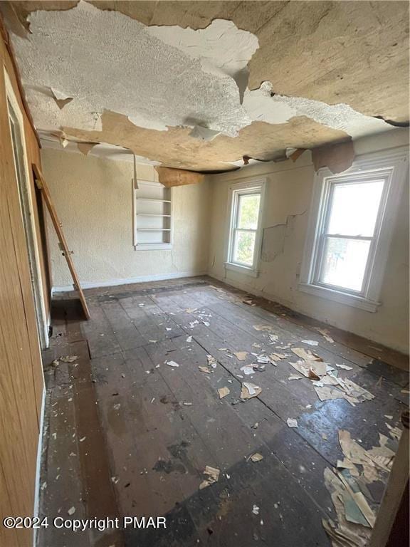 empty room with a textured ceiling