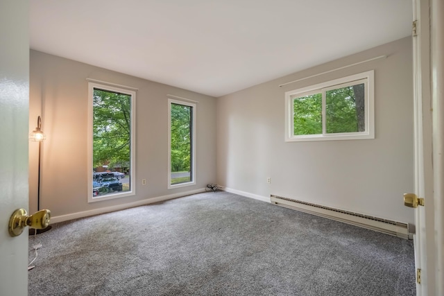 2166 Southport Dr, Bushkill, PA 18324 - carpeted empty room featuring baseboard heating, plenty of natural light, and baseboards