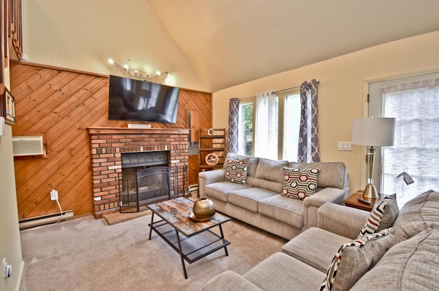 594 Sullivan Trl, Long Pond, PA 18334 - living area featuring wood walls, a baseboard radiator, a fireplace, a wall mounted air conditioner, and carpet