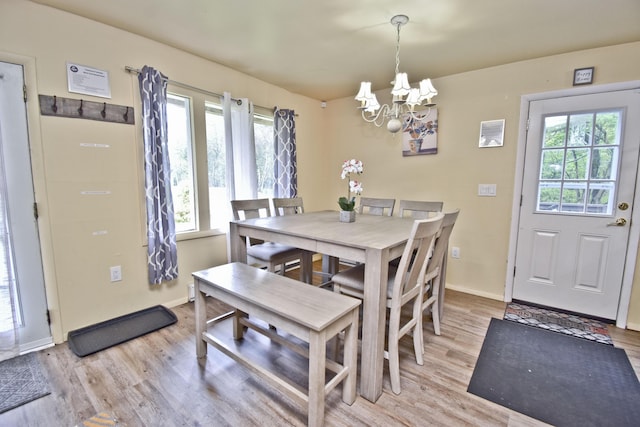 594 Sullivan Trl, Long Pond, PA 18334 - dining room featuring plenty of natural light, a chandelier, and light wood-type flooring