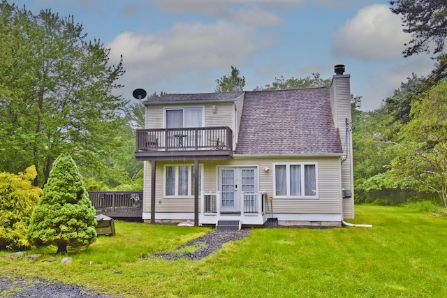 594 Sullivan Trl, Long Pond, PA 18334 - back of property with french doors, a chimney, a lawn, a balcony, and a shingled roof