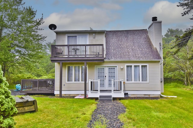 594 Sullivan Trl, Long Pond, PA 18334 - rear view of house featuring a chimney, a balcony, a yard, and roof with shingles