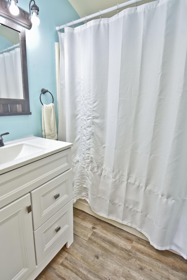 594 Sullivan Trl, Long Pond, PA 18334 - bathroom with vanity, wood finished floors, and curtained shower