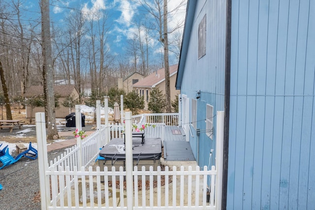 view of yard featuring fence and a deck