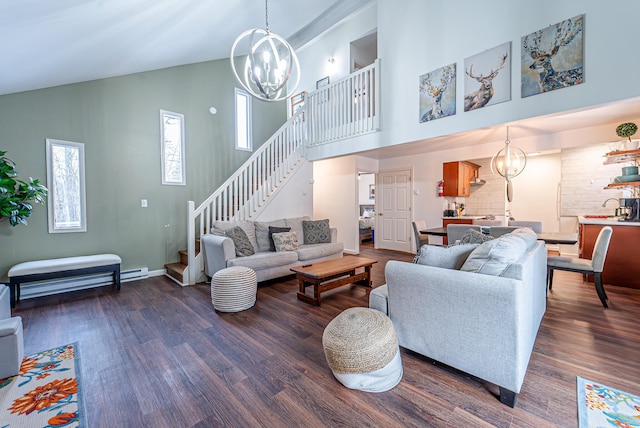 living room featuring a chandelier, high vaulted ceiling, baseboards, stairway, and dark wood finished floors