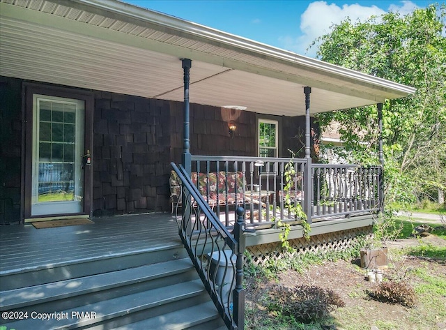 deck featuring covered porch