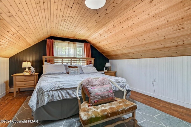 188 Olde Schoolhouse Rd, Cresco, PA 18326 - bedroom with wooden ceiling, wood finished floors, a baseboard radiator, and vaulted ceiling