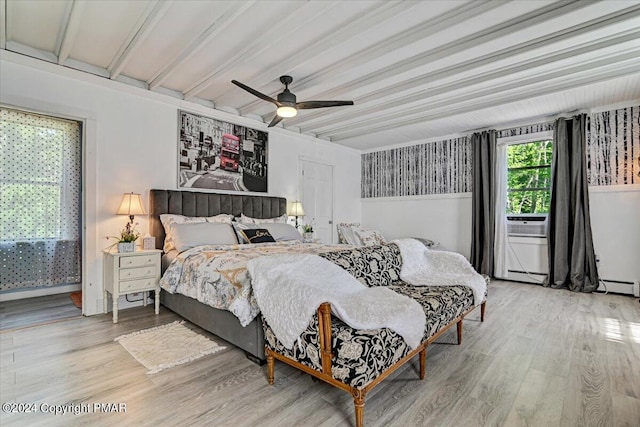 188 Olde Schoolhouse Rd, Cresco, PA 18326 - bedroom with beam ceiling, a baseboard heating unit, ceiling fan, and wood finished floors