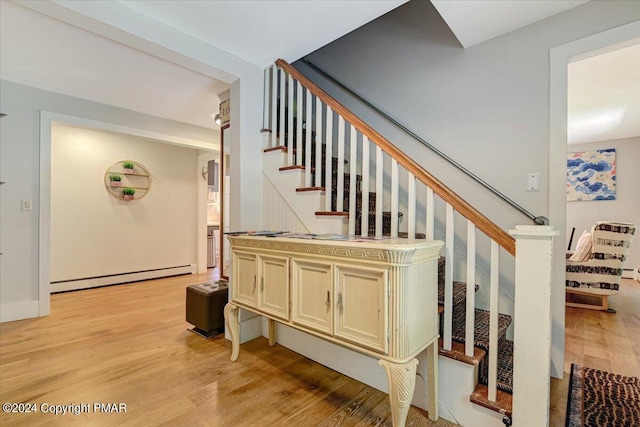 188 Olde Schoolhouse Rd, Cresco, PA 18326 - stairway featuring a baseboard heating unit and wood finished floors