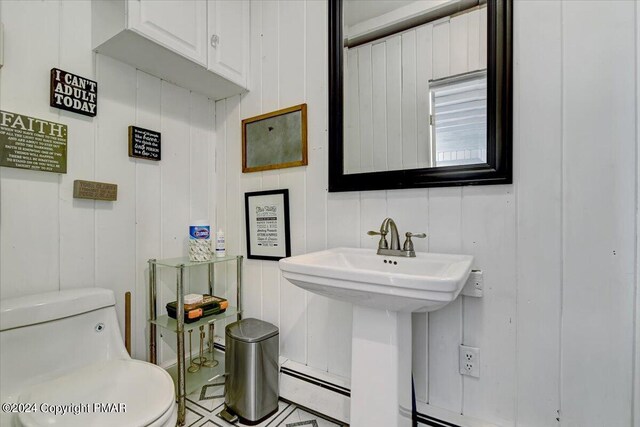 188 Olde Schoolhouse Rd, Cresco, PA 18326 - bathroom with toilet and a baseboard radiator