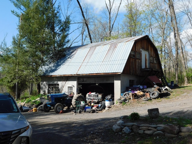 1212 Lower Cherry Valley Rd, Stroudsburg, PA 18360 - exterior space featuring dirt driveway and a garage