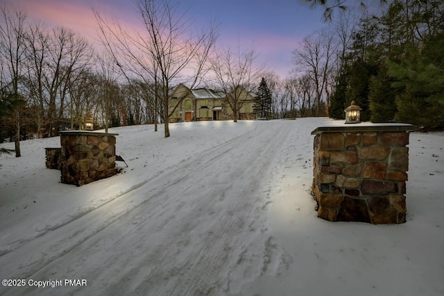 view of road with driveway