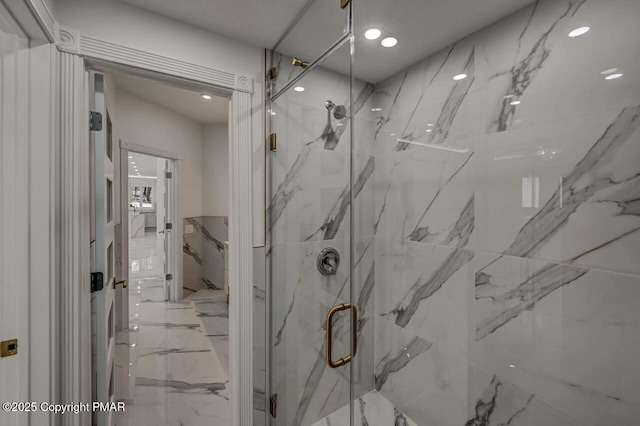 full bathroom with marble finish floor, a marble finish shower, and recessed lighting