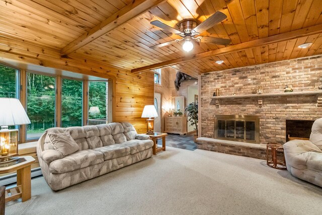 2173 Tuscarora Dr, Pocono Lake, PA 18347 - living room with carpet, wooden ceiling, a ceiling fan, a brick fireplace, and wooden walls
