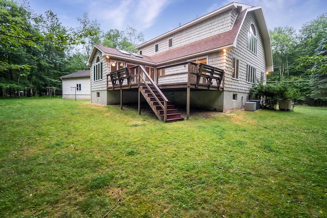 2173 Tuscarora Dr, Pocono Lake, PA 18347 - back of house with a wooden deck, stairs, a lawn, and roof with shingles
