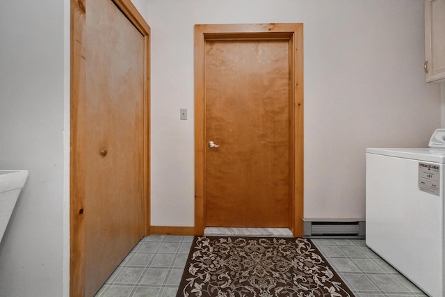 2173 Tuscarora Dr, Pocono Lake, PA 18347 - laundry area with washer / clothes dryer, a baseboard heating unit, and light tile patterned flooring