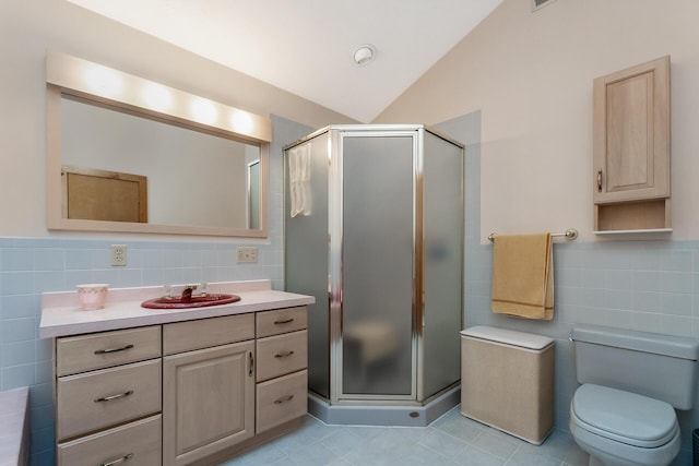 2173 Tuscarora Dr, Pocono Lake, PA 18347 - bathroom featuring tile walls, vanity, a stall shower, tile patterned flooring, and lofted ceiling