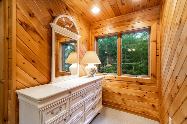 2173 Tuscarora Dr, Pocono Lake, PA 18347 - detailed view of wood walls, wood ceiling, carpet, and recessed lighting