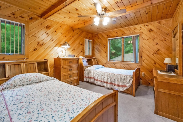 2173 Tuscarora Dr, Pocono Lake, PA 18347 - bedroom with multiple windows, a wooden ceiling with exposed beams, carpet floors, and wooden walls