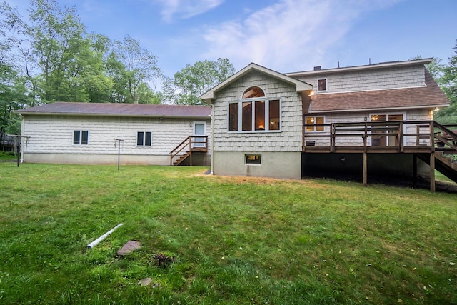 2173 Tuscarora Dr, Pocono Lake, PA 18347 - back of house featuring stairway, a wooden deck, a lawn, and roof with shingles