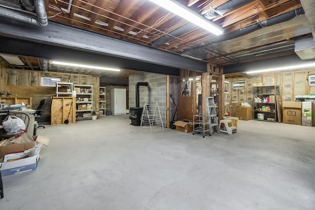 2173 Tuscarora Dr, Pocono Lake, PA 18347 - unfinished below grade area featuring a wood stove