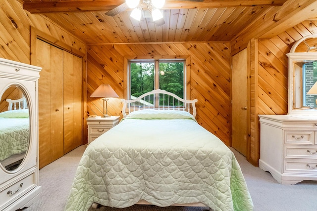 2173 Tuscarora Dr, Pocono Lake, PA 18347 - bedroom featuring light colored carpet, wooden ceiling, and wood walls