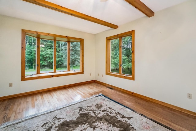 2173 Tuscarora Dr, Pocono Lake, PA 18347 - unfurnished room with wood-type flooring and beamed ceiling