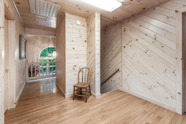 2173 Tuscarora Dr, Pocono Lake, PA 18347 - corridor featuring wooden walls, wooden ceiling, and hardwood / wood-style floors