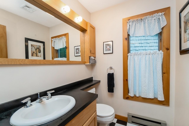 2173 Tuscarora Dr, Pocono Lake, PA 18347 - bathroom with a baseboard heating unit and vanity
