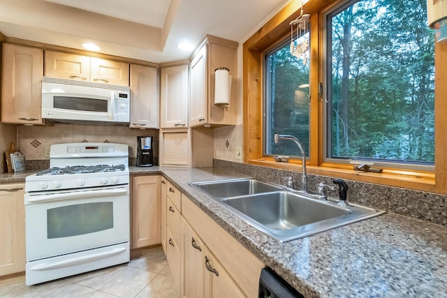 2173 Tuscarora Dr, Pocono Lake, PA 18347 - kitchen with white appliances, light tile patterned floors, recessed lighting, backsplash, and light brown cabinetry