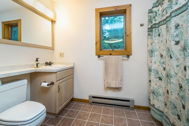 2173 Tuscarora Dr, Pocono Lake, PA 18347 - bathroom featuring a baseboard heating unit, vanity, tile patterned flooring, and a shower with shower curtain