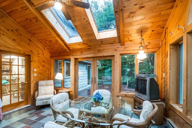 2173 Tuscarora Dr, Pocono Lake, PA 18347 - sunroom / solarium featuring french doors, a skylight, vaulted ceiling, and baseboard heating