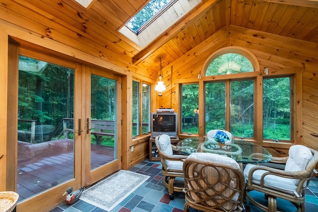 2173 Tuscarora Dr, Pocono Lake, PA 18347 - sunroom featuring vaulted ceiling, wooden walls, a skylight, and french doors
