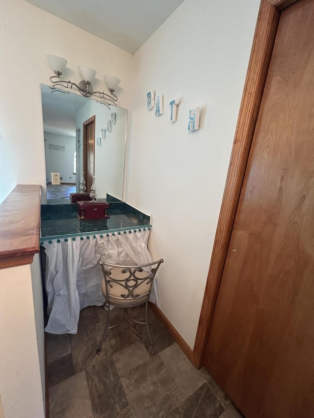 bathroom with baseboards