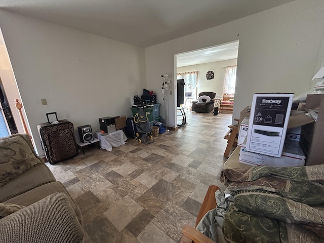 living area with stone finish flooring