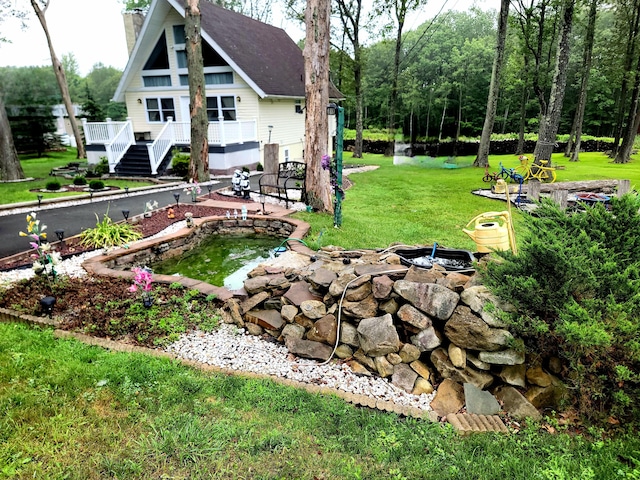 1025 Cricket Ln, Long Pond, PA 18334 - view of grassy yard with a deck