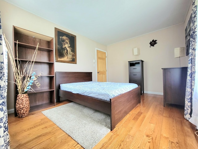 1025 Cricket Ln, Long Pond, PA 18334 - bedroom with wood finished floors and ornamental molding