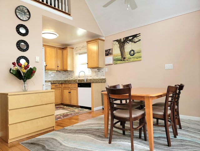 1025 Cricket Ln, Long Pond, PA 18334 - kitchen with dishwasher, light wood-type flooring, tasteful backsplash, lofted ceiling, and ceiling fan