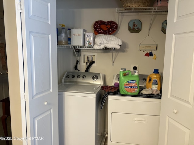 washroom with laundry area and washing machine and clothes dryer