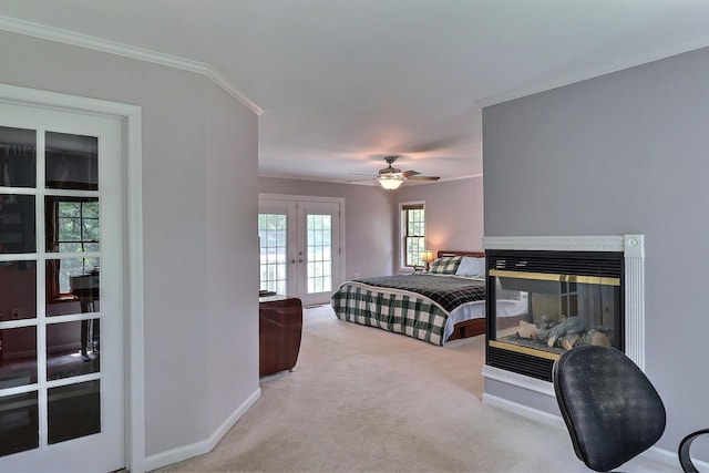 5181 Hilltop Cir E, Stroudsburg, PA 18301 - carpeted bedroom featuring french doors, access to exterior, a multi sided fireplace, crown molding, and ceiling fan
